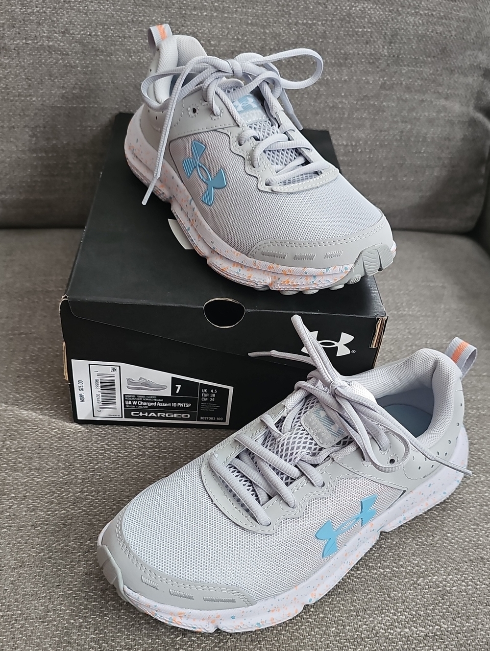 Under Armour Womens 7 CHARGED ASSERT Sneakers Grey w/ Blue Logo & Orange Speckle